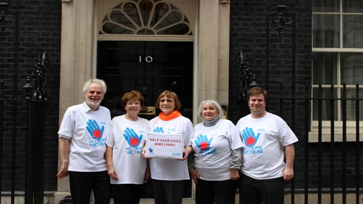 Martin (left) with campaigners outside 10 Downing Street.