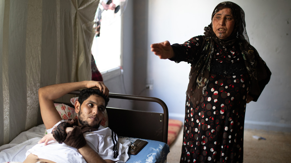 Disabled Ramadan Haj, 23, and his mother Houriya, from Aleppo, live in Beirut, near the location of the explosion - August 2020. 