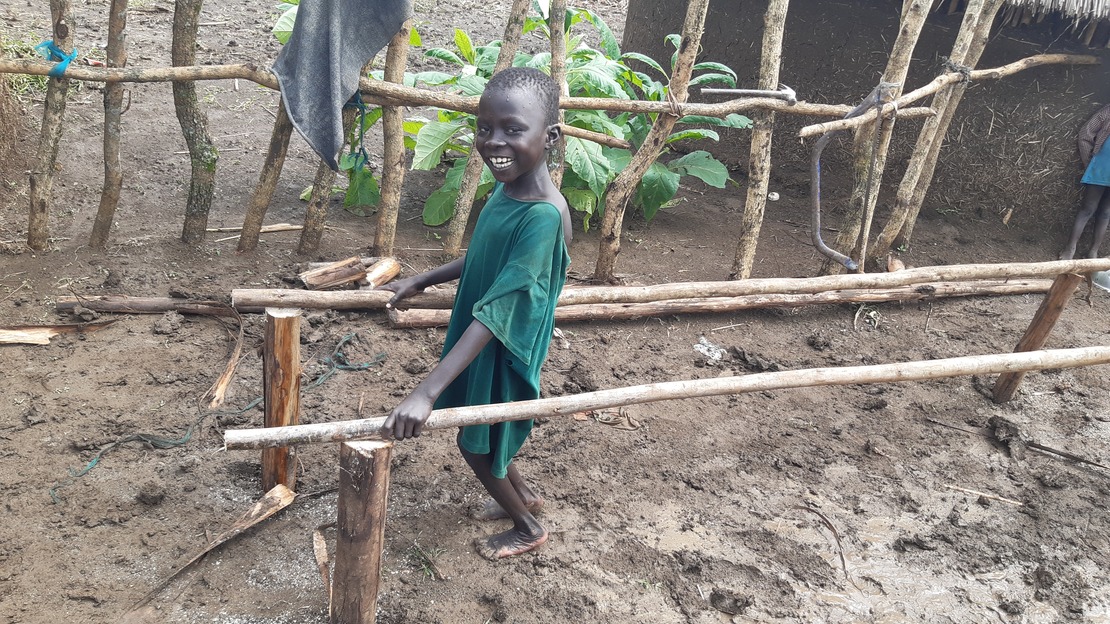 Gatluak Muon uses parallel bars from HI to practice his rehabilitation exercises, Gambella, Ethiopia. 