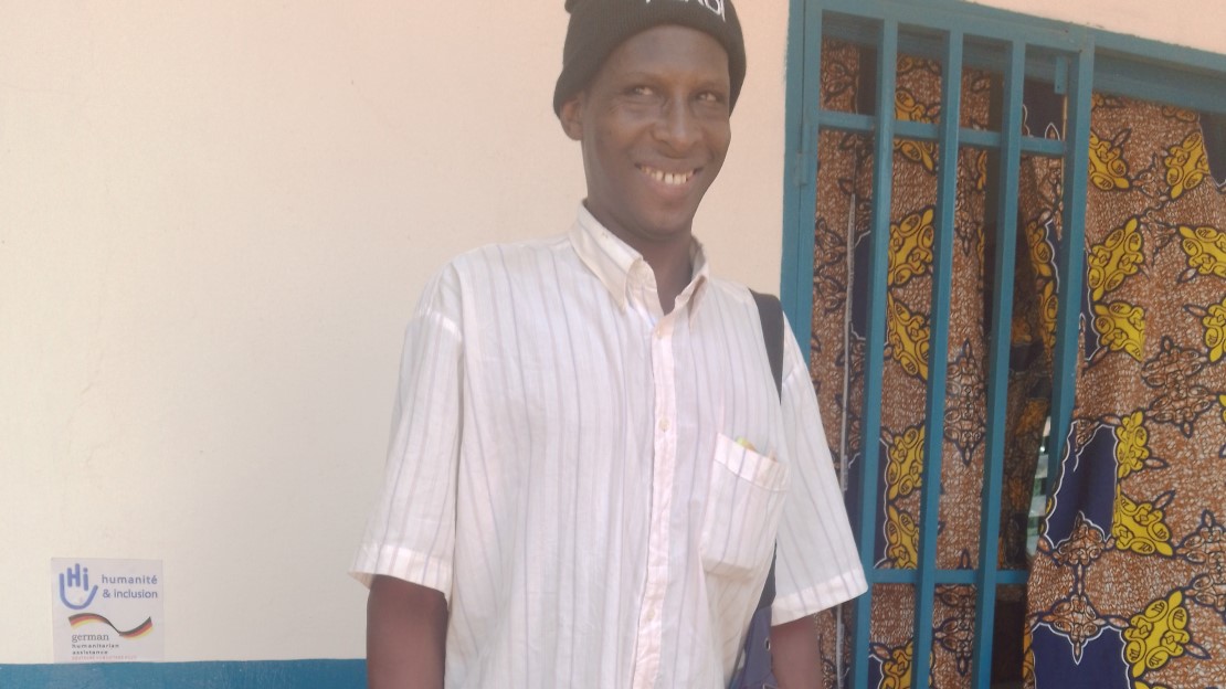 Abderamane standing outside HI’s rehabilitation room at Bambari hospital.