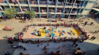 HI’s staff and volunteers providing recreational activities for children in a UNRWA shelter, in Khan Younès West, a town in the south of the Gaza Strip, October 2023