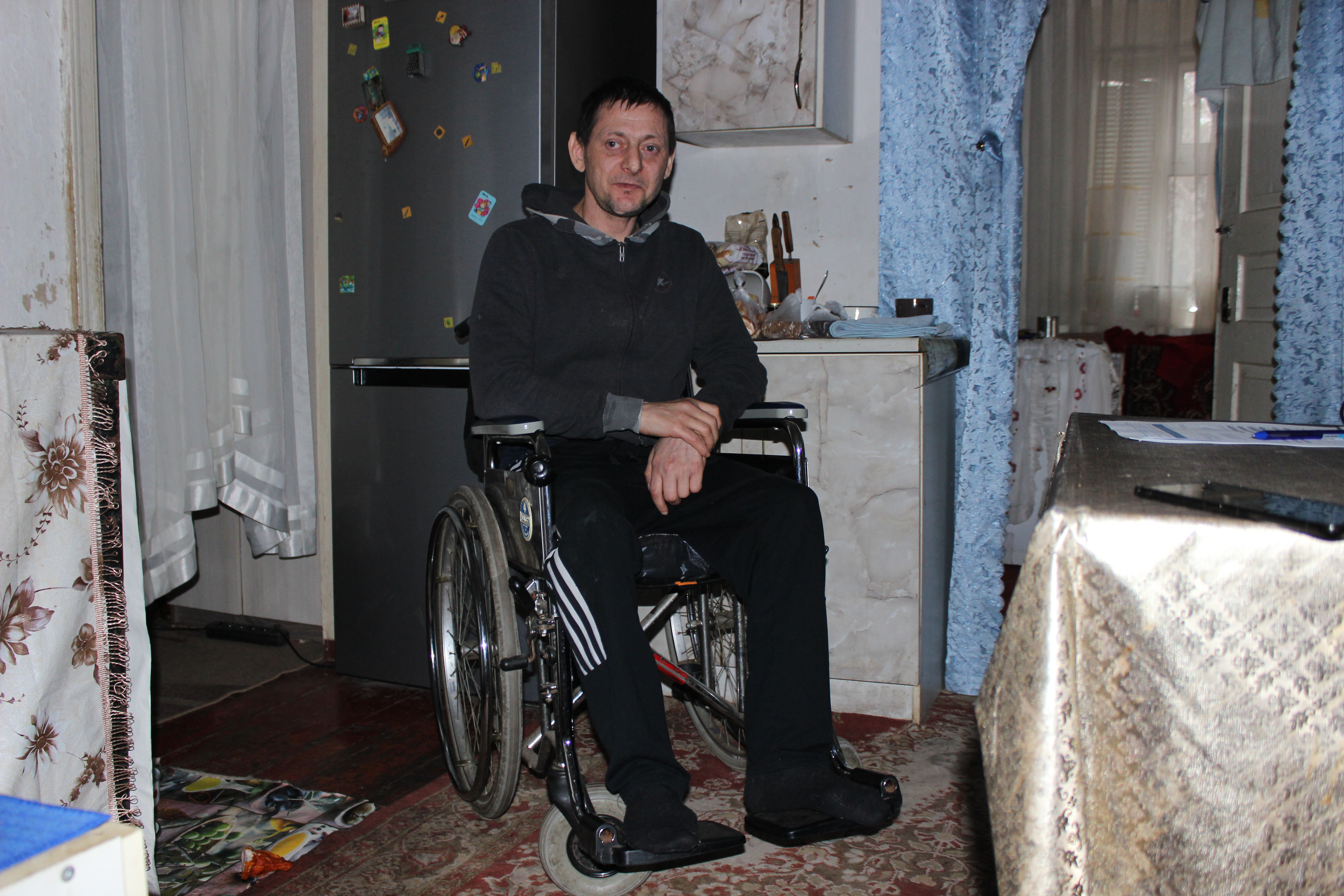 Oleksandr Hurtov has a disability following an unknown disease. He is now a displaced person after a drone attack at his place. HI. Dnipro, November 2025.