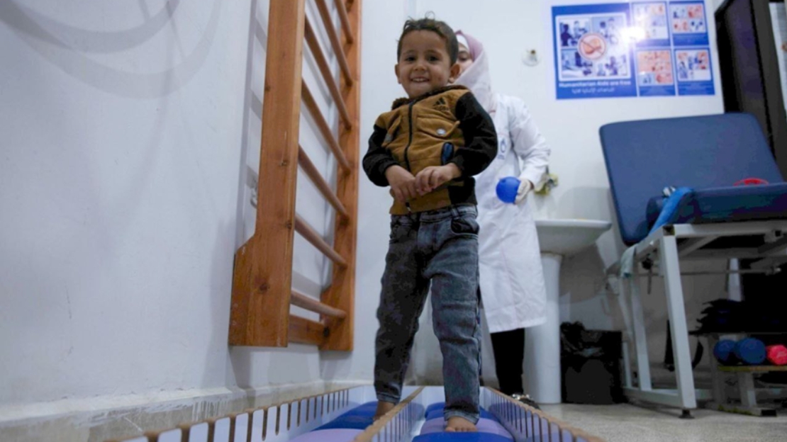 In Syria Ibrahim is learning to walk and play like a child again