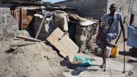 A man with a disability who lost his home during cyclone Idai and is now sleeping in a makeshift shelter.