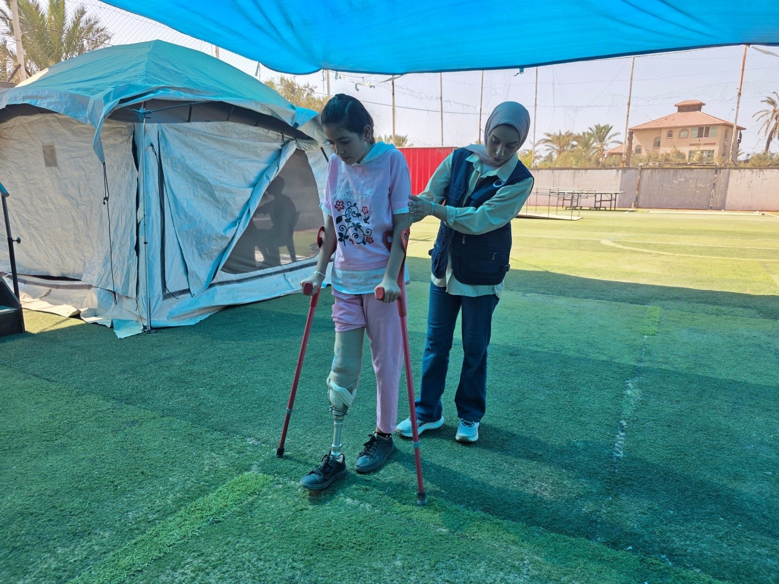 Fayez and Mena hand in hand to walk again