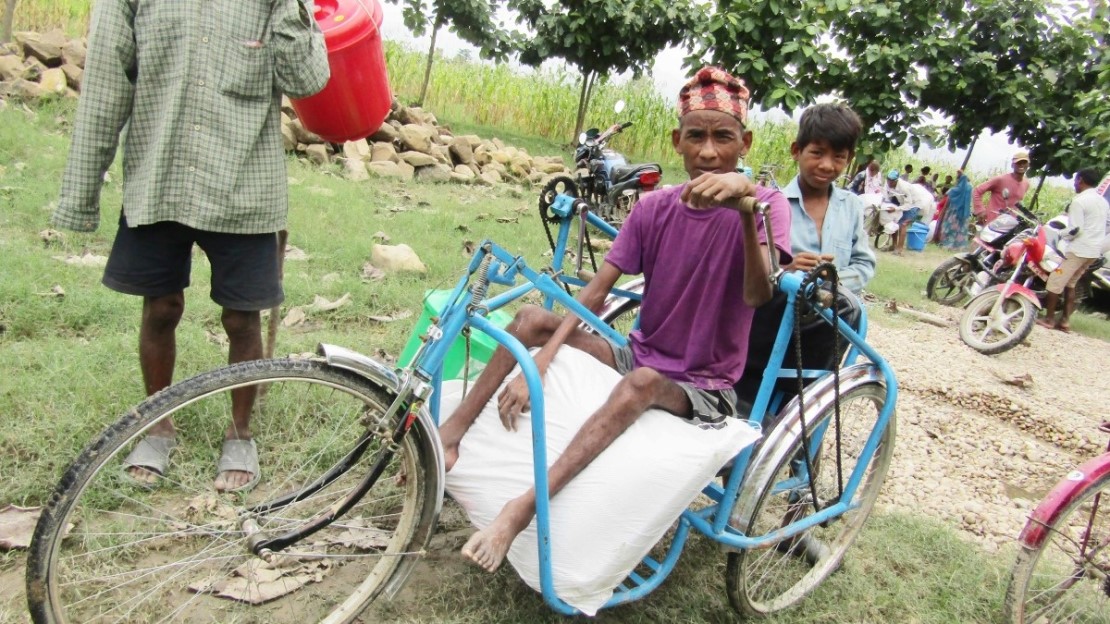 A person in a wheelchair stands where HI's activities take place.