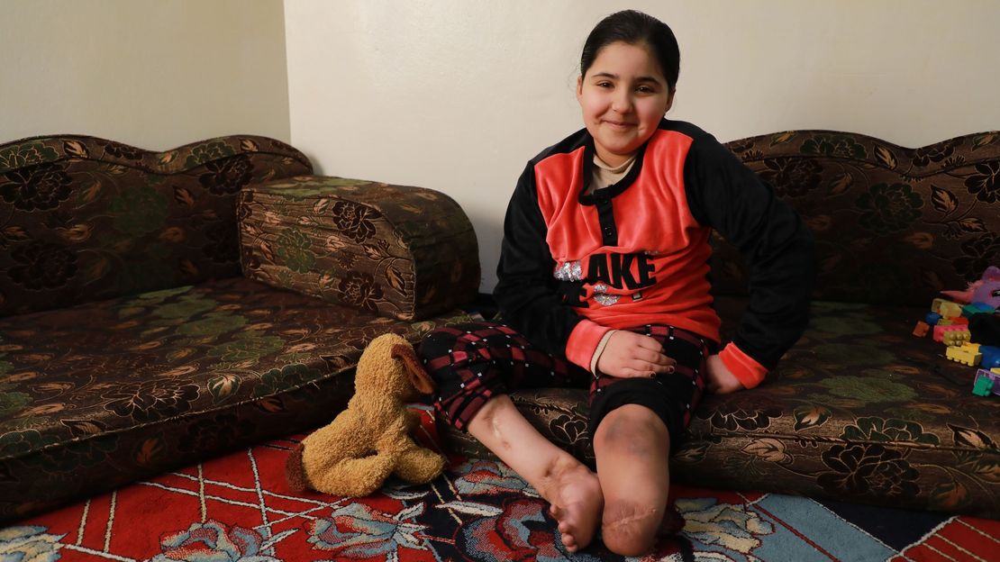 Salam being fitted for a prosthetic leg, Jordan