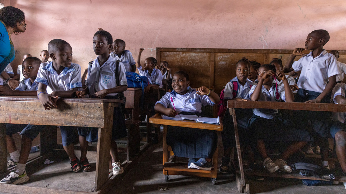 Daïsane enjoys a citizenship class led by Mrs Agnès at Lemba inclusive school.