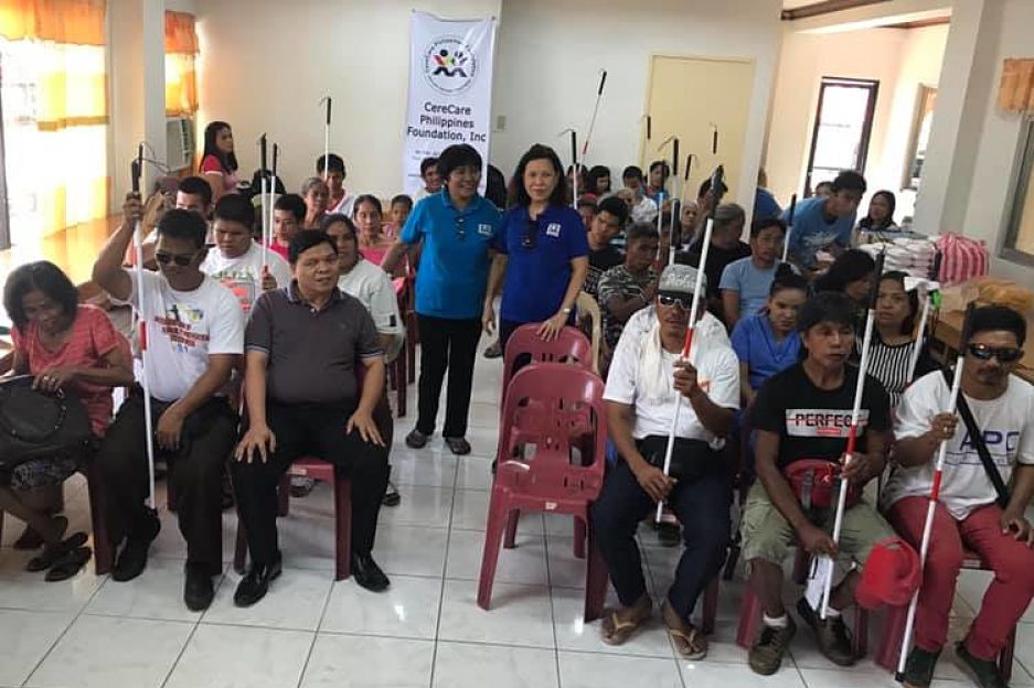 Group photo of Victor Rescober and members of the Philippine Blind Union