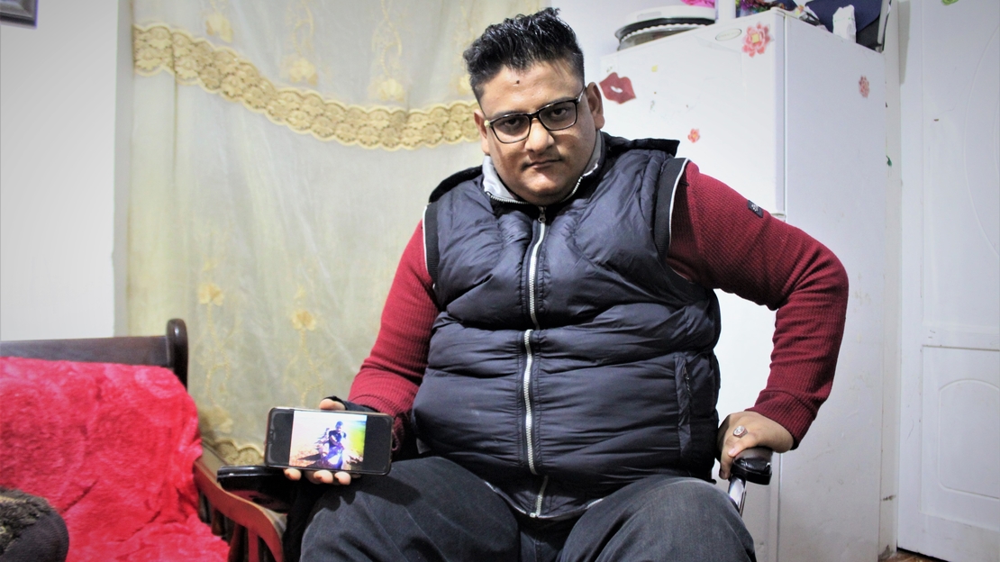 Osama in his wheelchair