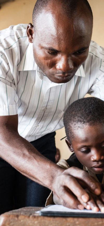 Trésor, 7 years old, is partially sighted. He learns Braille in an ordinary school Trésor, 7 years old, is partially sighted. He learns Braille in an ordinary school