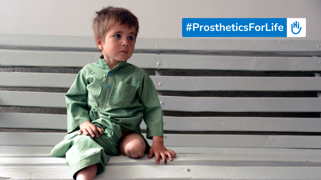 Sayed, a young boy with an amputated leg, sitting on a bench. Text overlaid: #ProstheticsForLife - HI