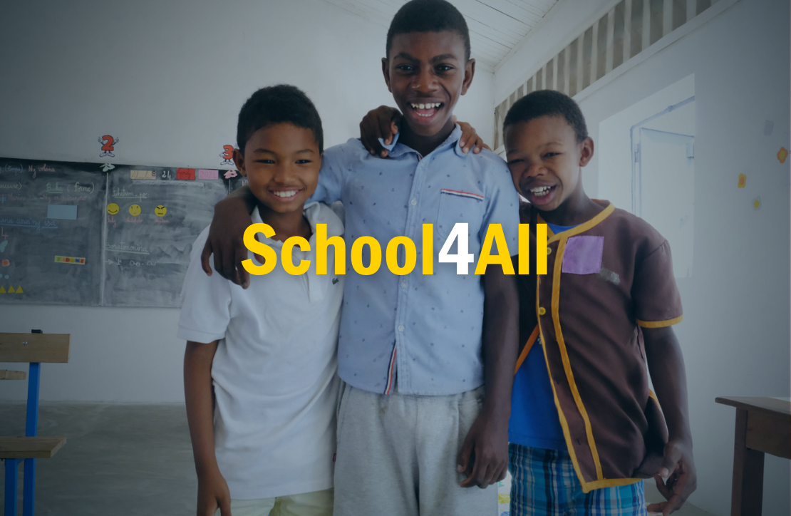 Group of children with disabilities in classroom with #School4All logo overlaid