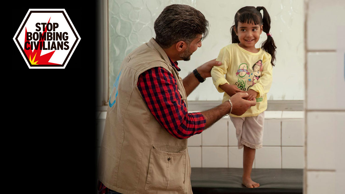 Hala, a young girl amputee with her HI physio