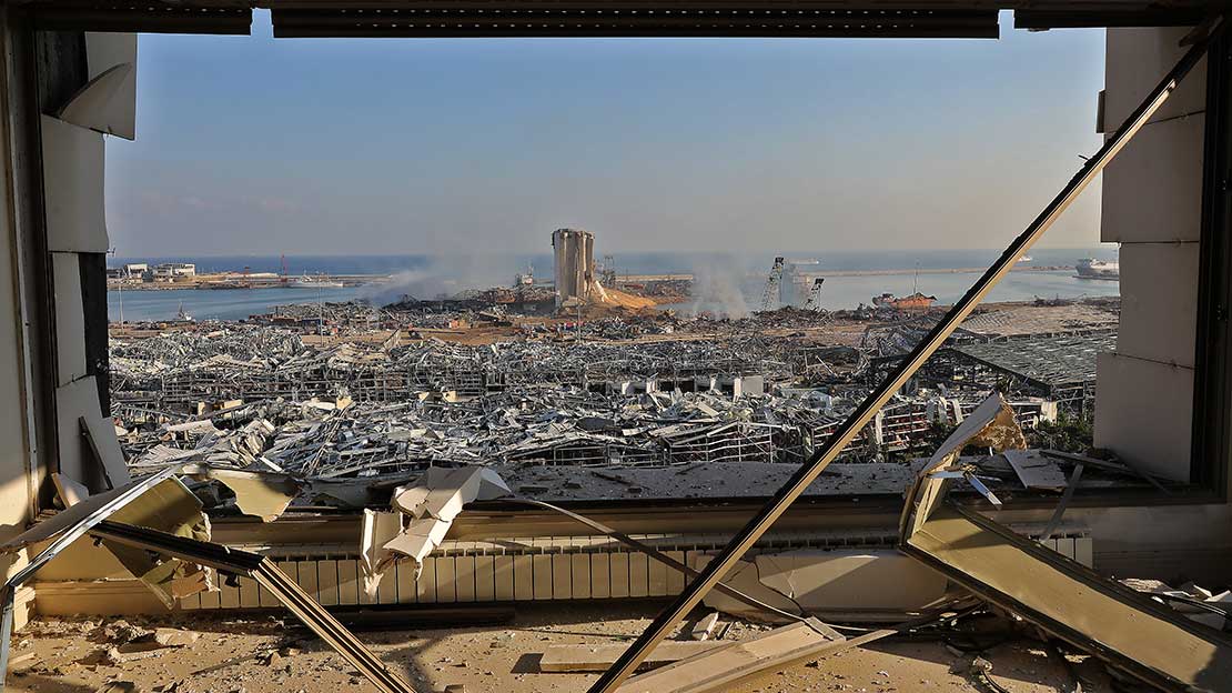 A view shows the aftermath of the blast at the port of Lebanon's capital Beirut, on August 4, 2020. Rescuers worked through the night after two enormous explosions ripped through Beirut's port, killing at least 100 people and injuring thousands. These explosions wrecked buildings across the Lebanese capital.; }}