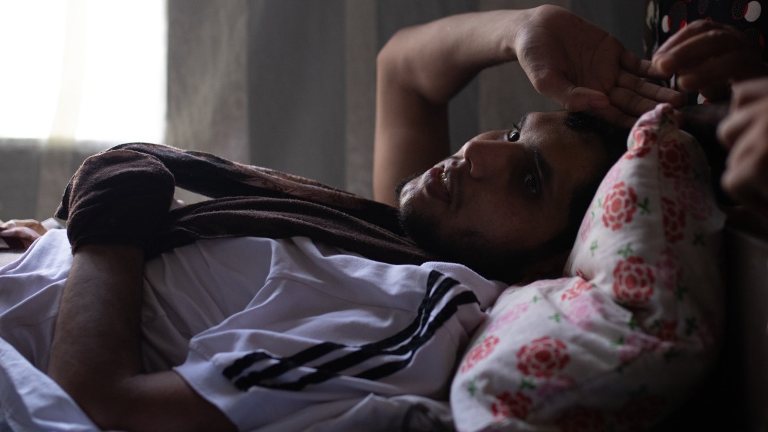 Ramadan Haj Dandal, 23, and his mother Houriya from Aleppo, in their house in Beirut. ; }}