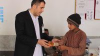 Mohamaed at HI's Kandahar rehabilitation centre with Suliman, a young amputee