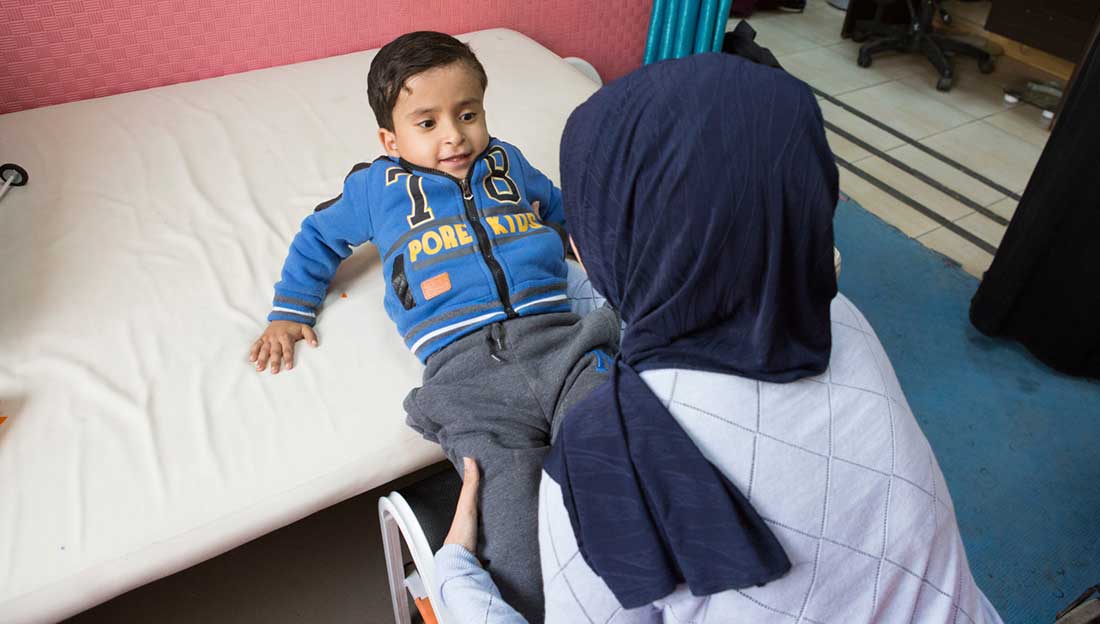 5-year-old Mohammed having a physiotherapy session, CDC Zarqa, Jordan