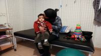 Abdel Kareem, 5, with his mother at the Mousawat rehabilitation centre, Lebanon; }}