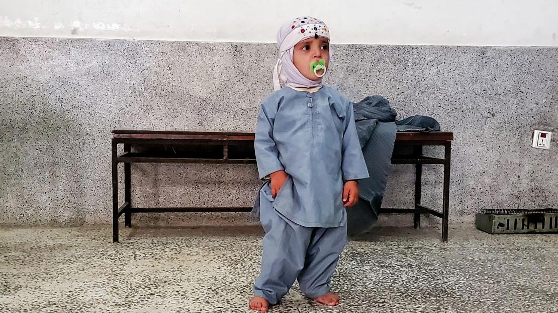 After the treatment of his club foot, Hidyatullah can easily stand up and walk; }}