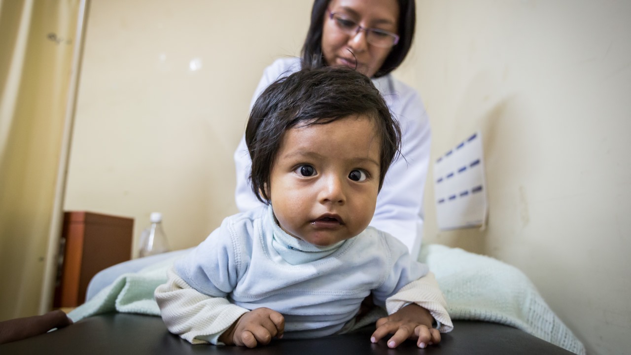 A child benefitting from Handicap International's rehabilitation project in Bolivia; }}