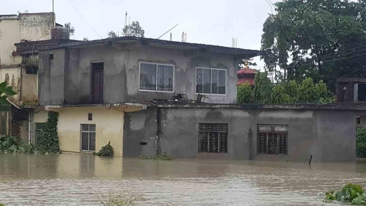 A building under water in the province of Terai, Nepal; }}