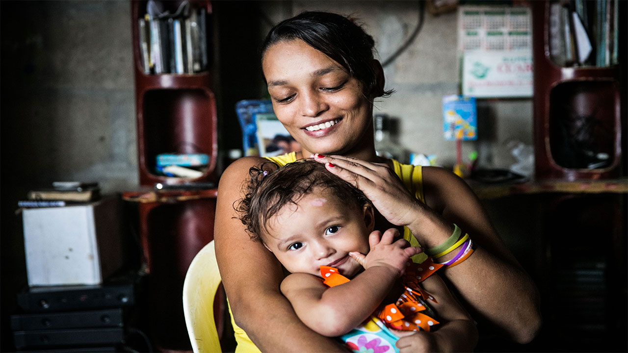 Irma with her daughter Maria Angel, Colombia.; }}