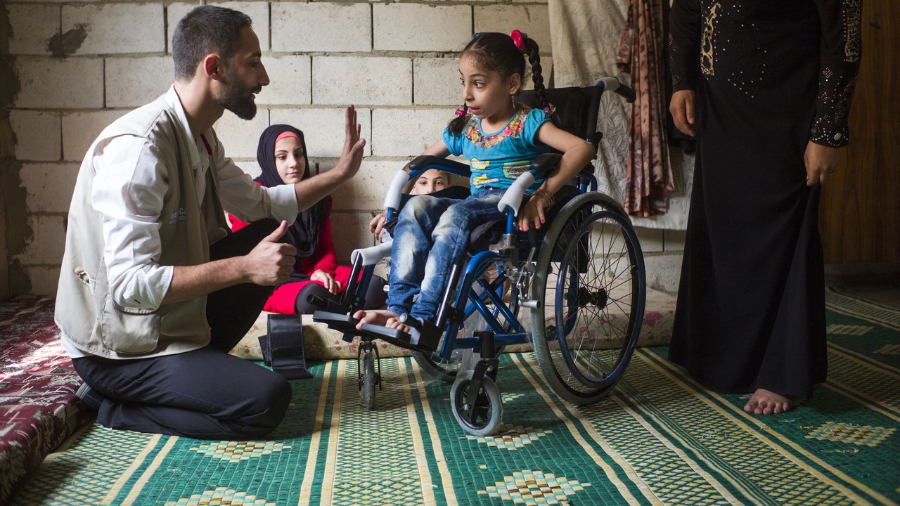 Handicap International provided a wheelchair to Dalal to help her become more active.; }}