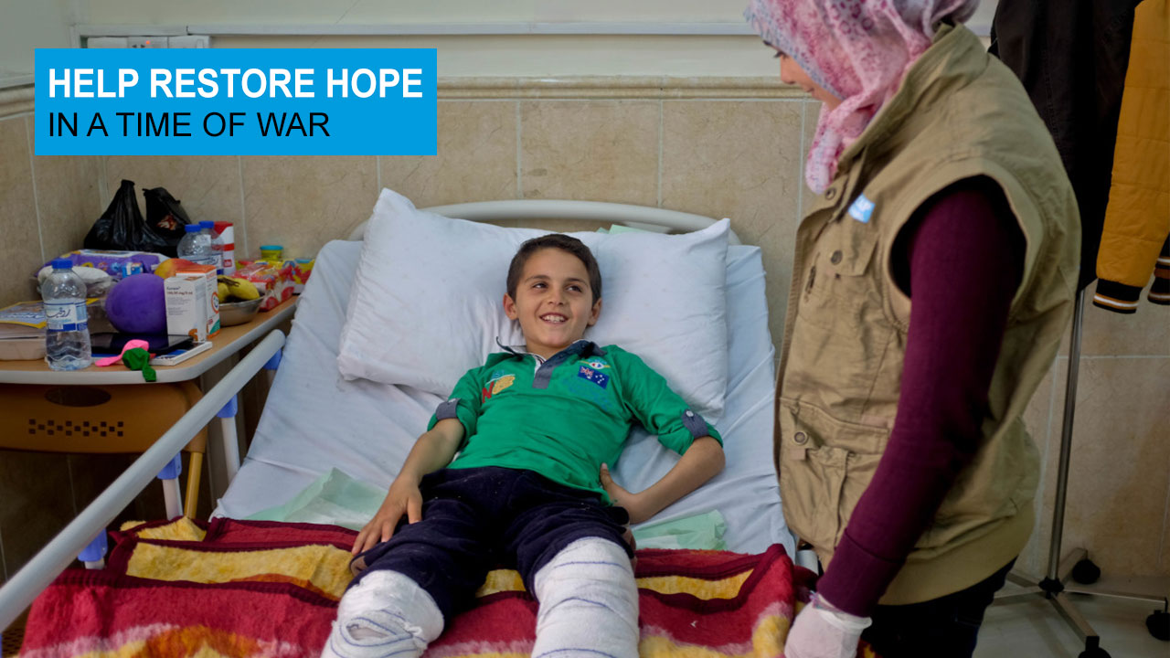 Bakr lying in his hospital bed, Iraq; }}