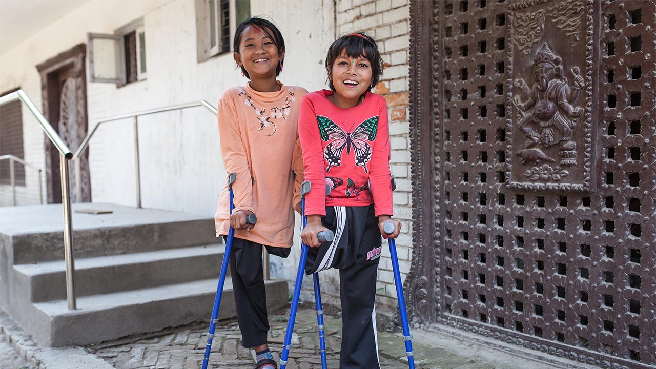 Nirmala and Khendo at the National Disabled Fund rehabilitation centre; }}