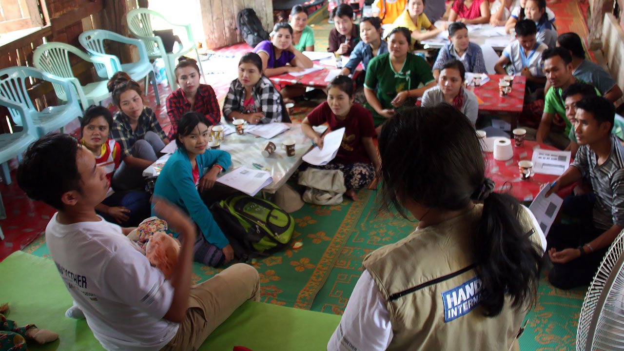 Training parents on child stimulation in Mae La refugee camp, Thailand.; }}