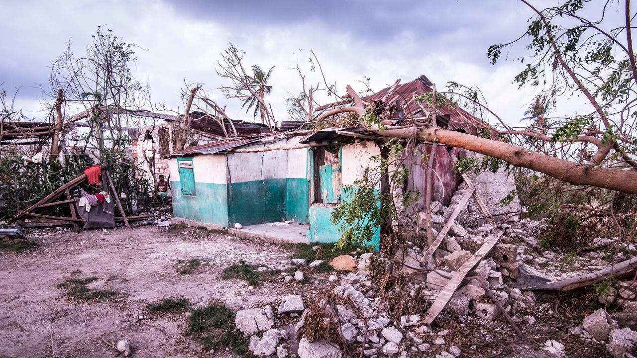 Archive photo: A house destroyed by Hurricane Matthew, October 2016; }}