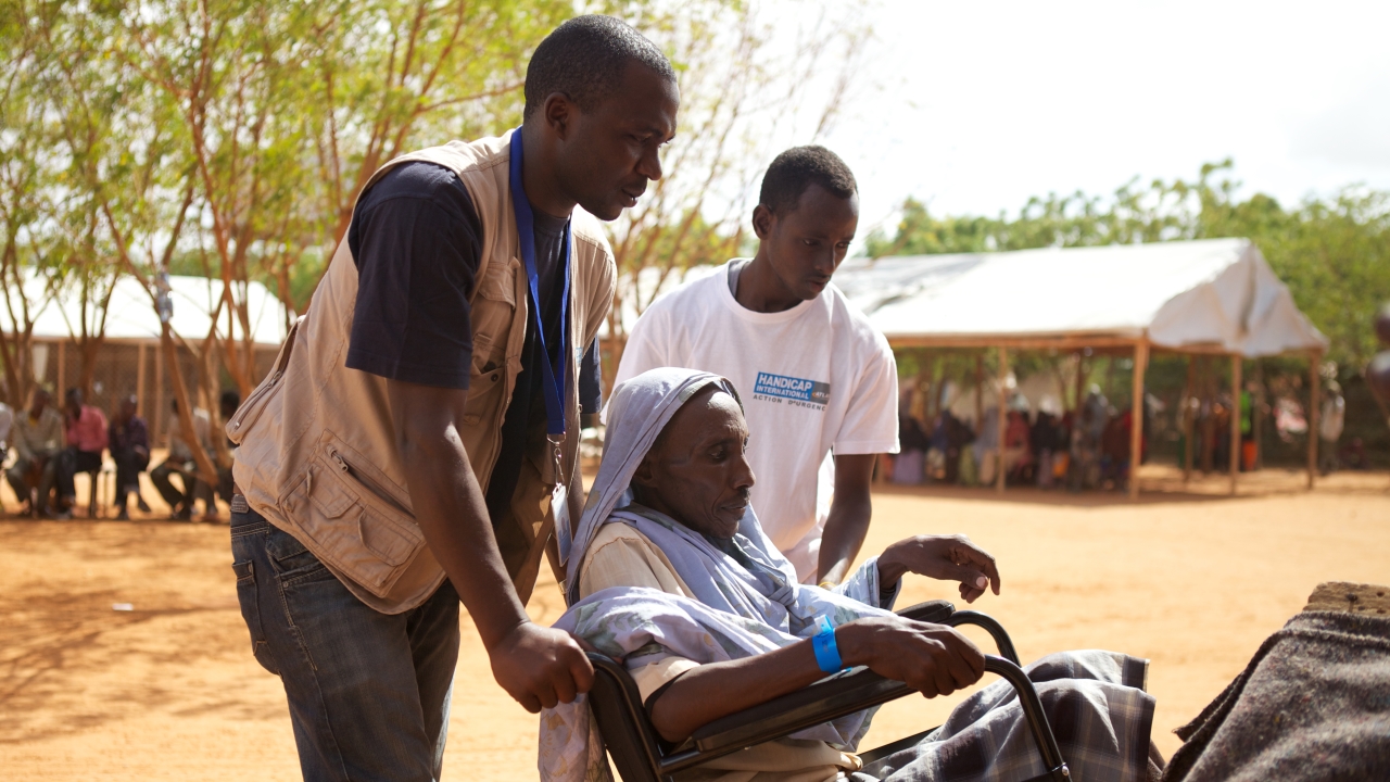 A person with disabilities being cared for in a camp in Dadaab. ; }}