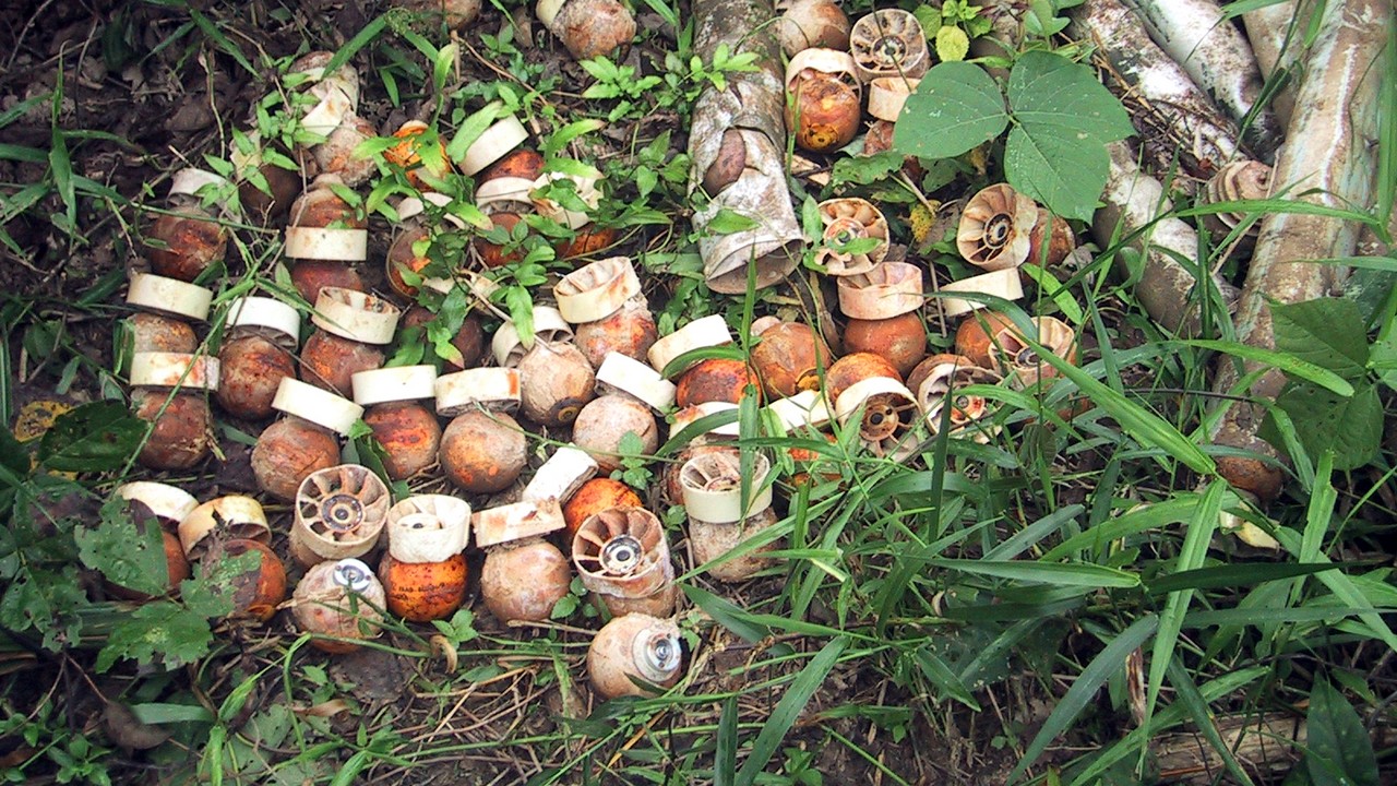 BLU 24 submunitions from a cluster bomb. Laos.; }}