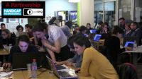 Participants taking part in the Mapathon at Handicap International Federation in Lyon; }}