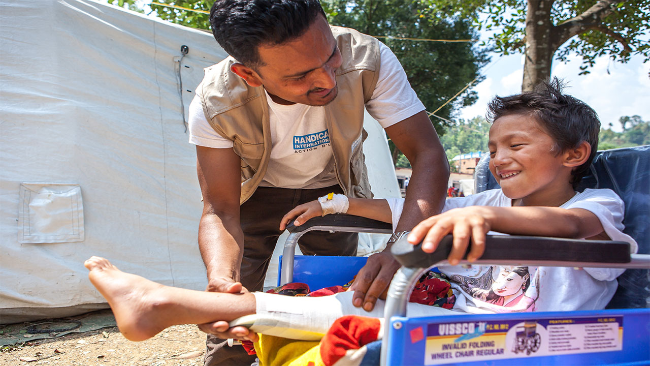 Chusang Tamang, 10, was injured in the earthquake by debris falling as he played outside his house. It is expected that Chusang will be able to walk in two months.Nepal.; }}