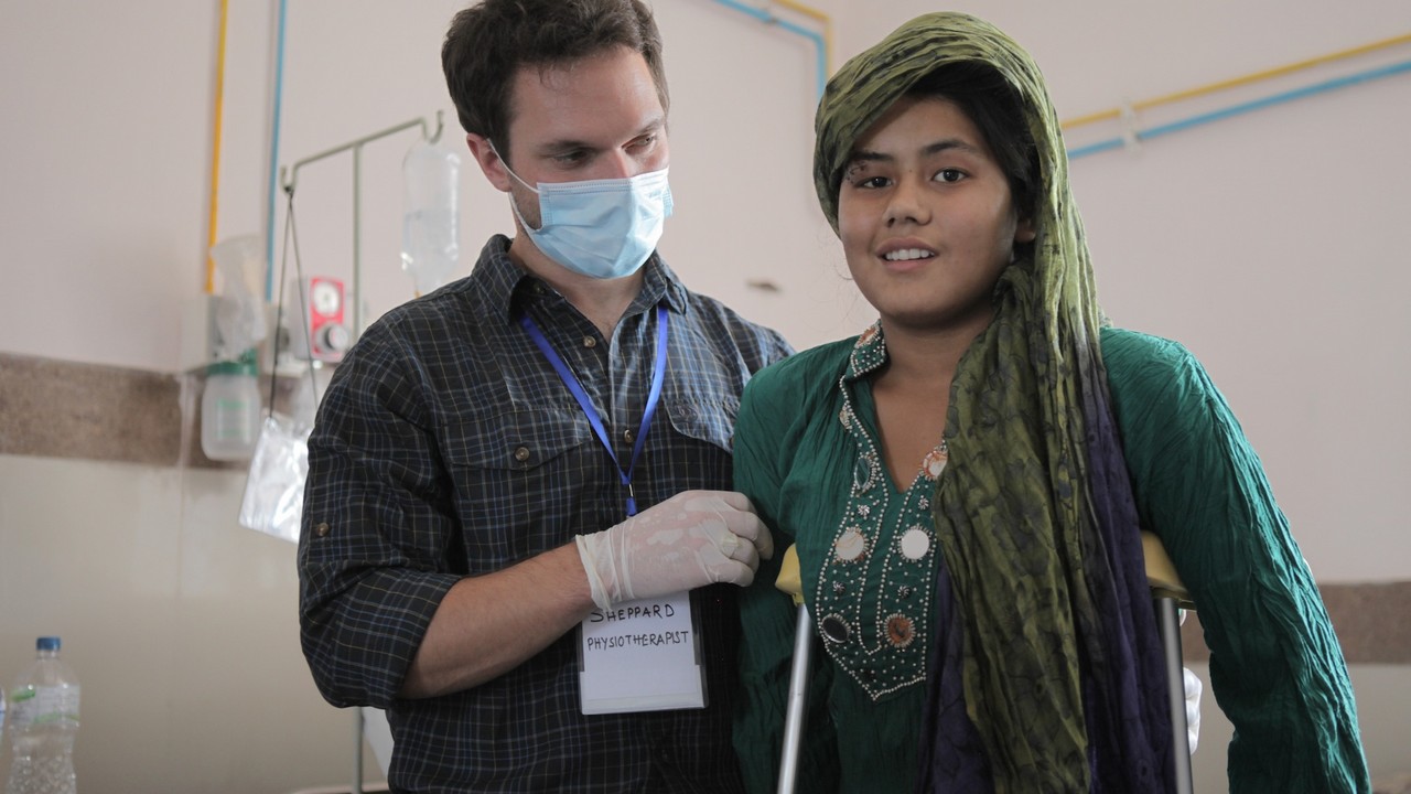 Earthquake victim Romila during a physiotherapy session. Nepal.; }}