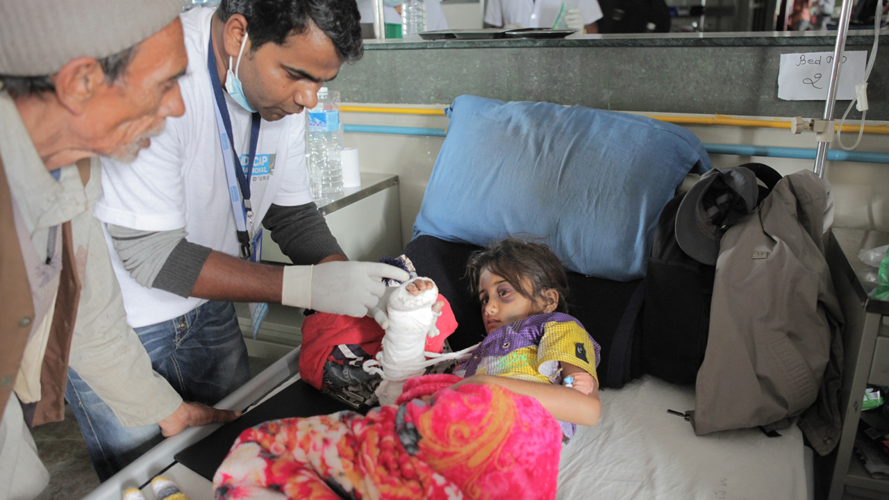 Salina with Handicap International physiotherapist, Jay. Nepal.; }}