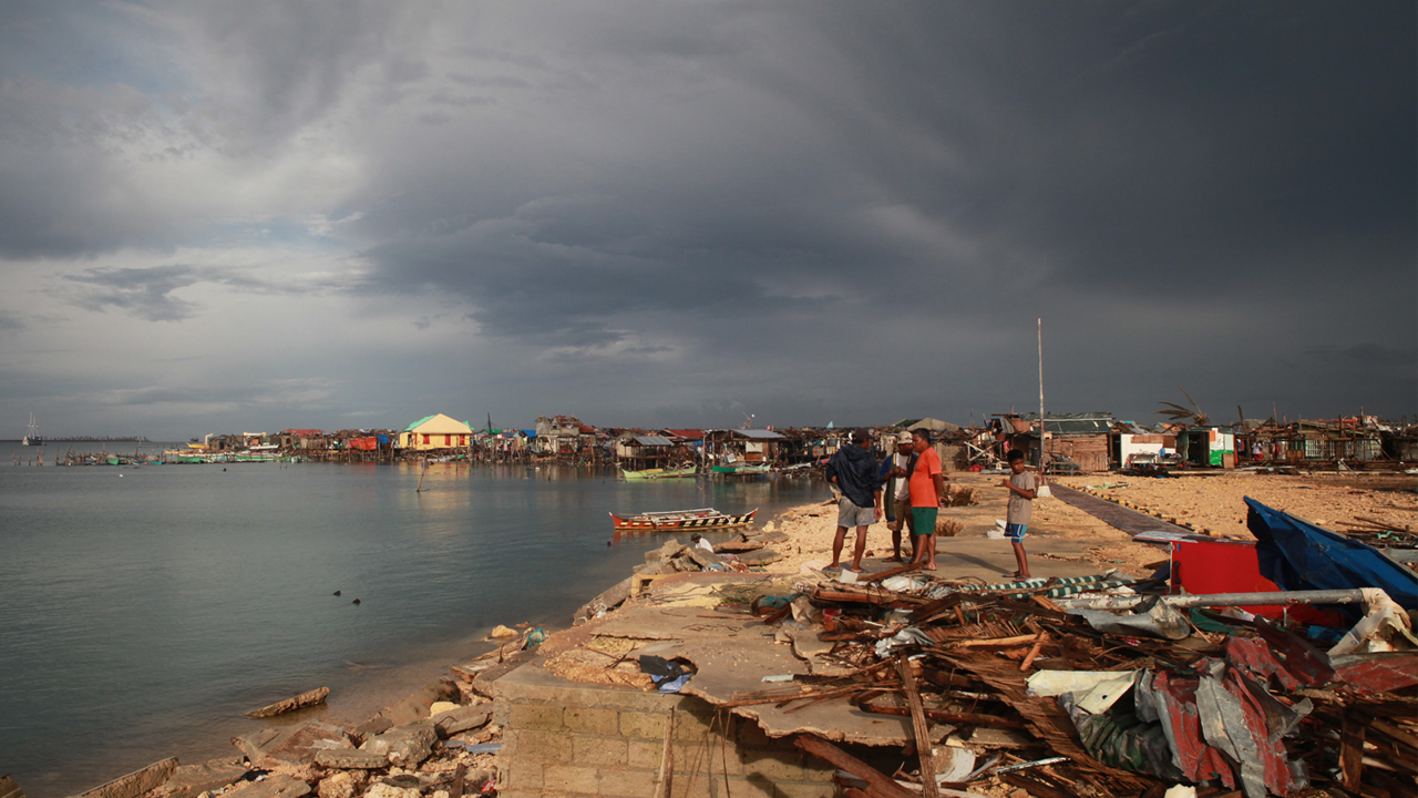 Typhoon Haima in the Philippines: Handicap International assessing the needs of those affected; }}