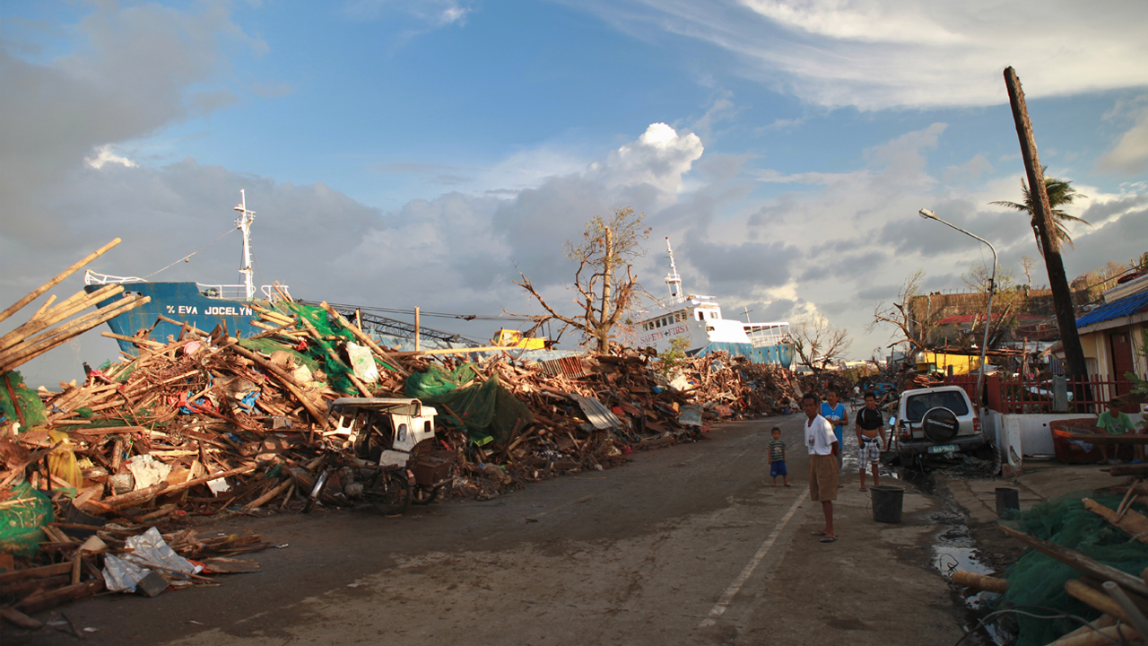 Destruction caused by typhoon Haiyan in November 2013.; }}