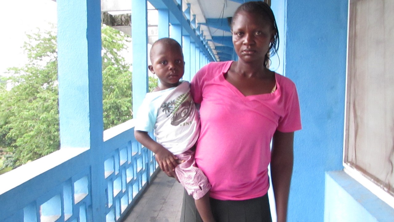 Two-year-old Glody with his mum. Democratic Republic of Congo.; }}