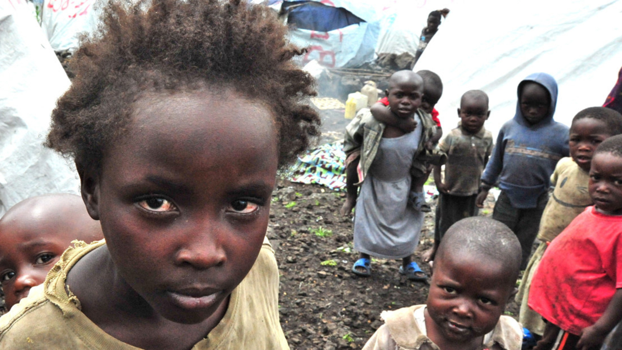 Group of children in Mugunga 3 camp near Goma (photo archive – 2013); }}