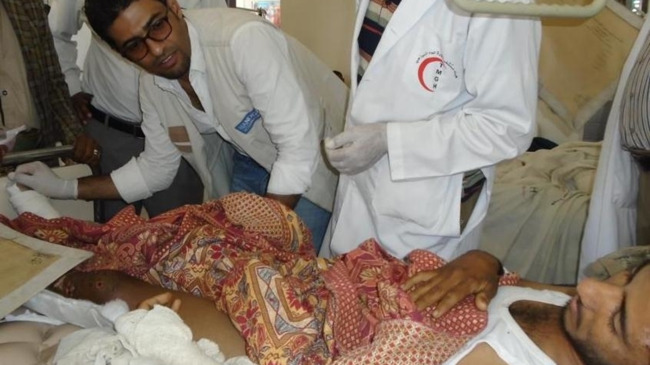 A patient is treated by Handicap International’s team in a hospital in Sana’a.; }}