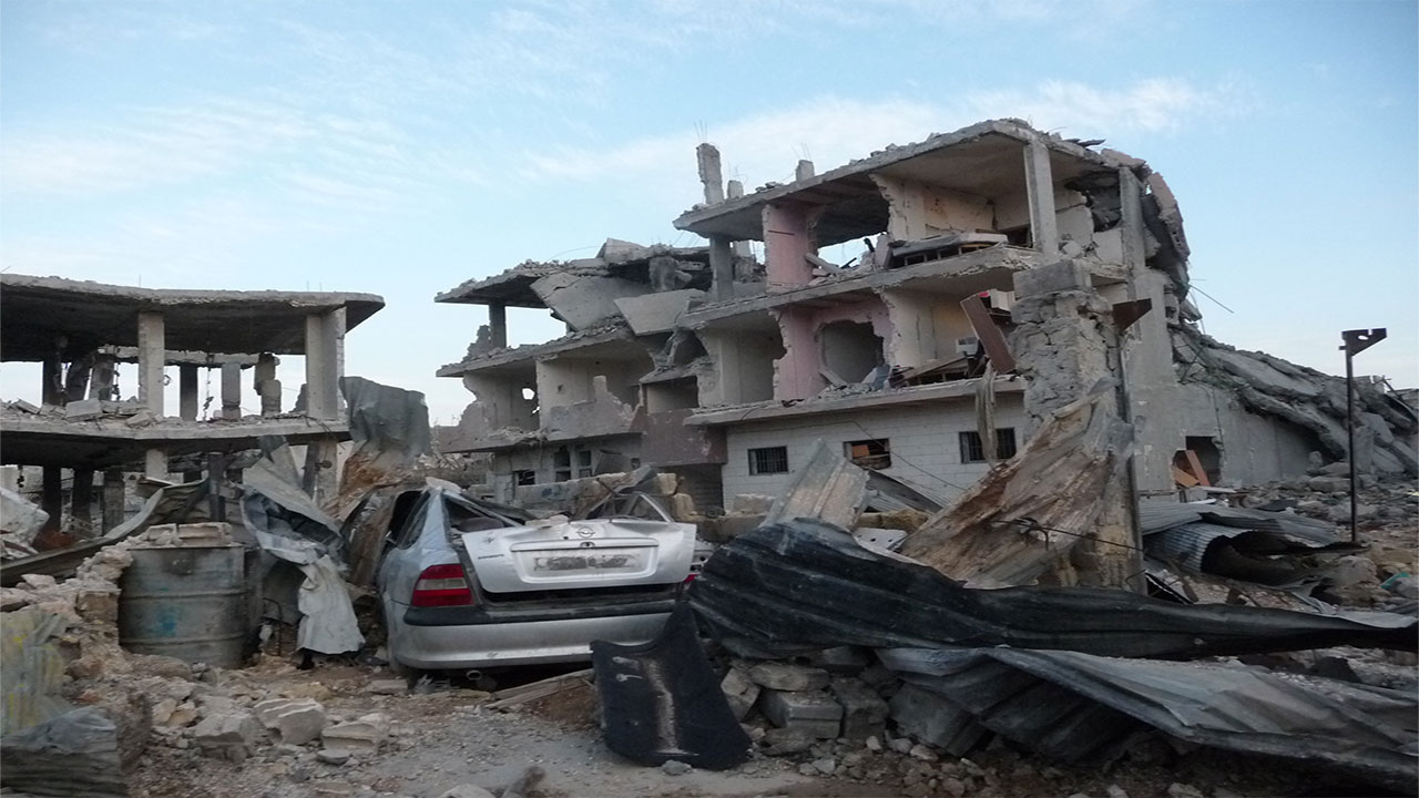 Destruction caused by explosive weapons in the Syrian city of Kobani.; }}