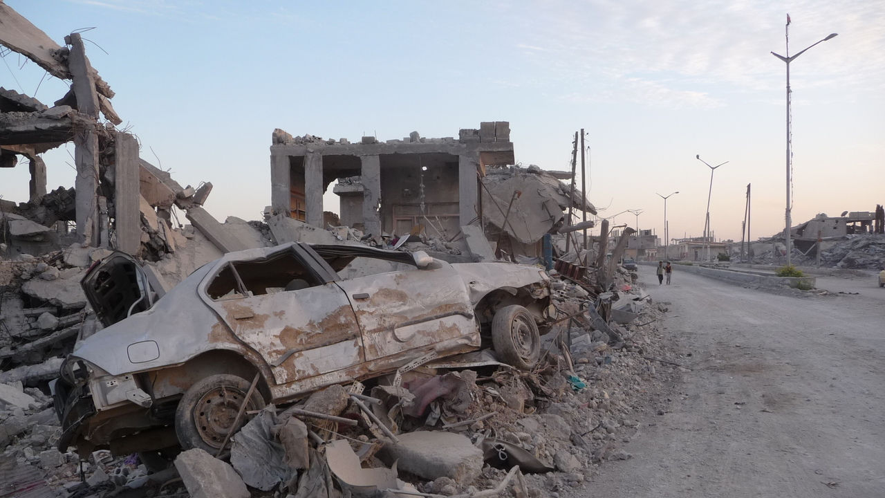 Destruction following the bombardement of Kobane in northern Syria; }}