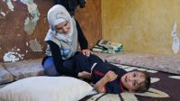 Fayez doing his rehabilitation exercises with Mariam. ; }}
