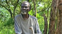 Joel, 71, who has taken refuge in Uganda. Many members of his family were killed.